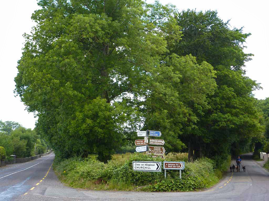 A fork in a rural road with two paths diverging.