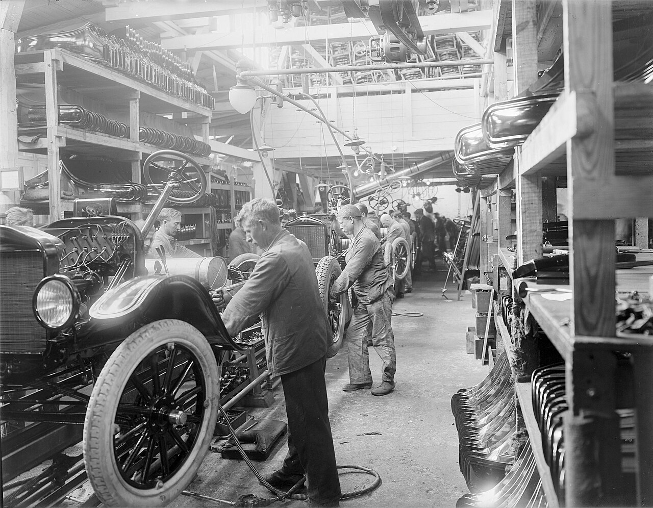 Workers on the Ford Motor Company assembly line in Copenhagen, 1923.