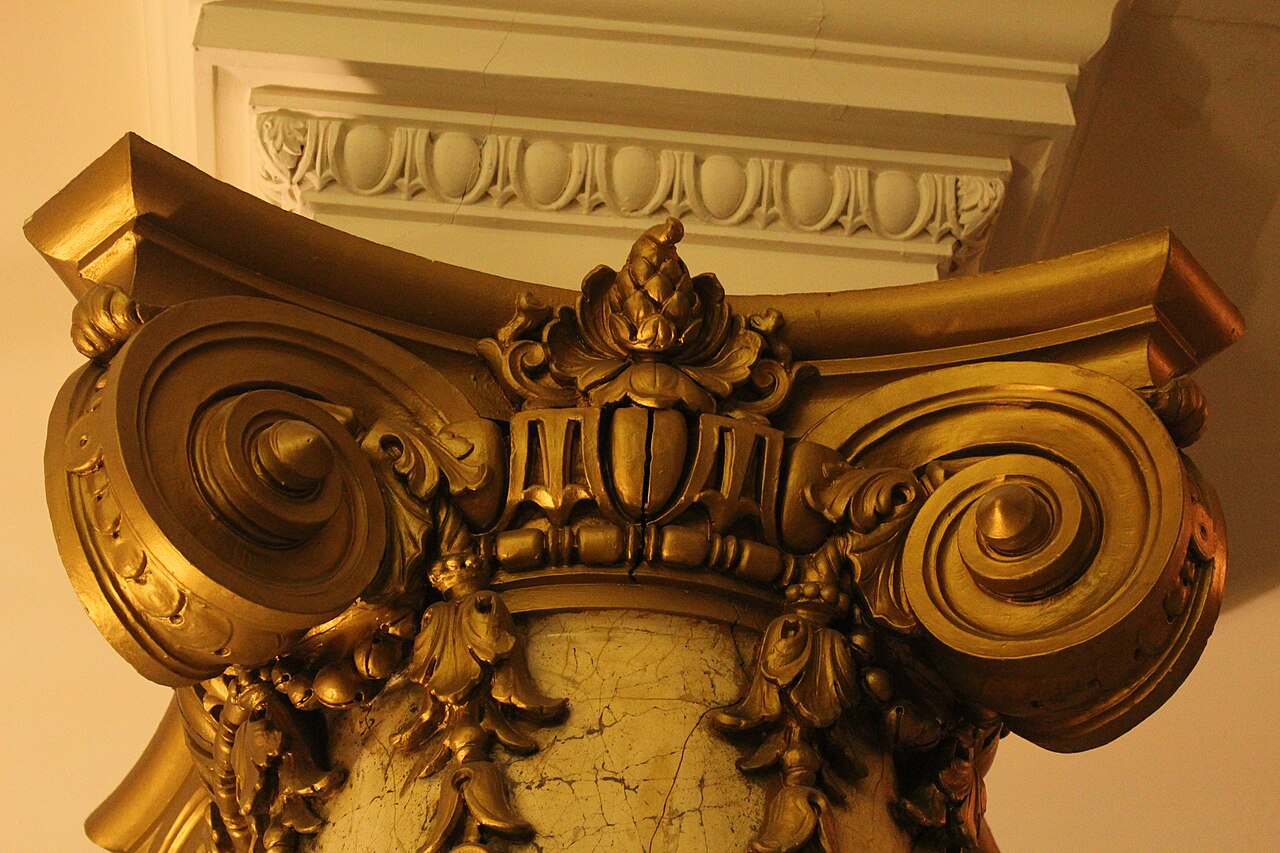 A jeweled crown symbolizing authority.