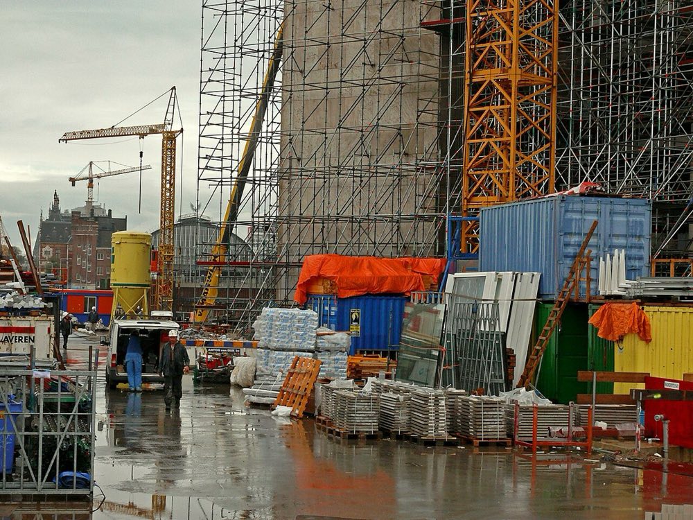 Scaffolding around a building under construction.